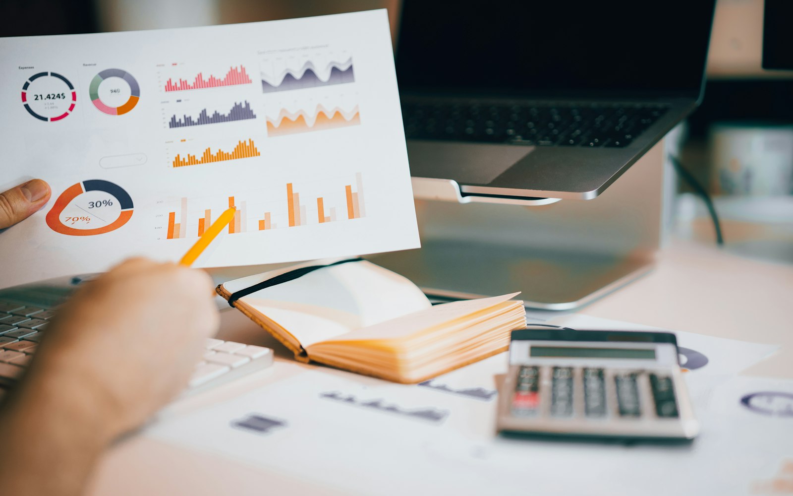 Analyst reviewing an industry report